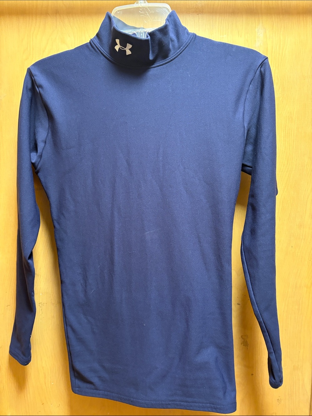 Under Armour long sleeve cold gear turtle neck. Size small.